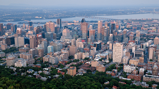Aerial view of downtown Montreal with Saint Lawrence River in the background, Quebec, Canada.
