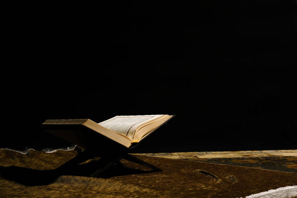 istock Al-Quran on praying mat 1391580764