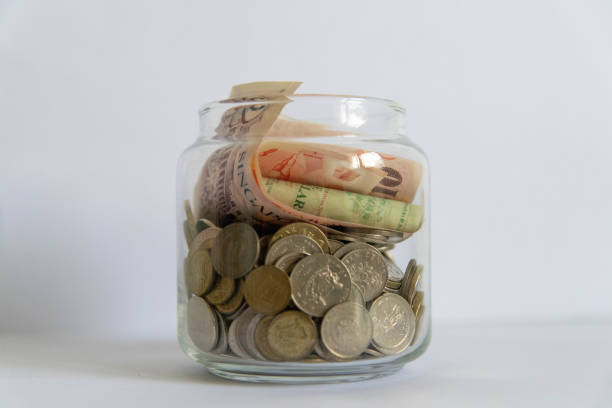 istock Jar of dollars and notes 1391582307