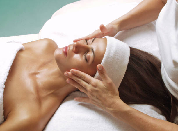 istock woman face treatment spa 1391585967