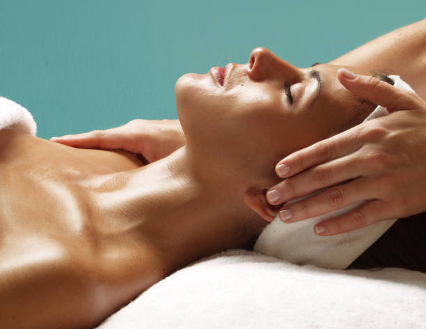 istock woman face massage treatment spa 1391585979