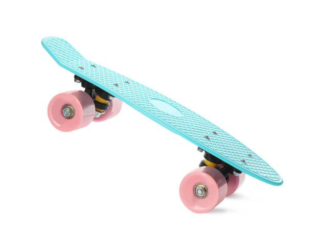 istock Turquoise skateboard with pink wheels isolated on white 1391590247