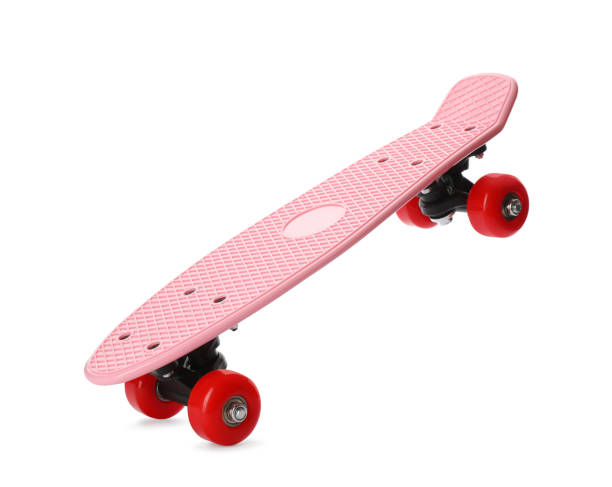 Pink skateboard with red wheels isolated on white