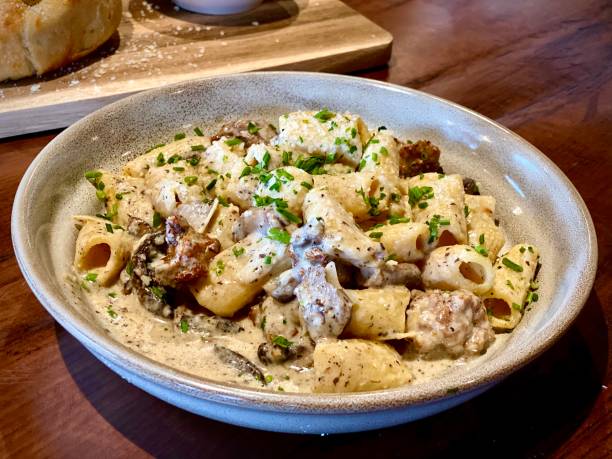 Rigatoni With Lamb Sausage & Wild Mushroom Truffle Cream Sauce Richly decadent a staple of Northern Italian fare rigatoni stock pictures, royalty-free photos & images