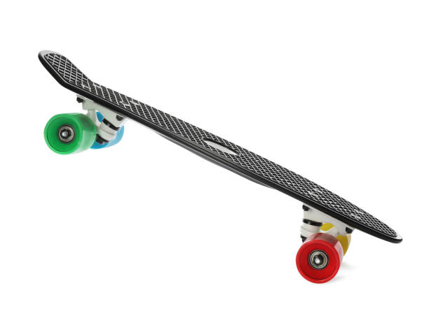 istock Black skateboard with colorful wheels isolated on white 1391593797