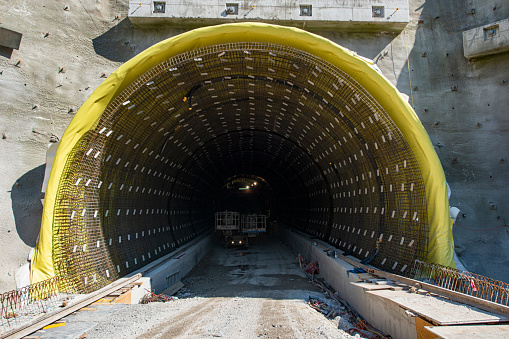 Construction work during the building of a highway tunnel in the European Alps.