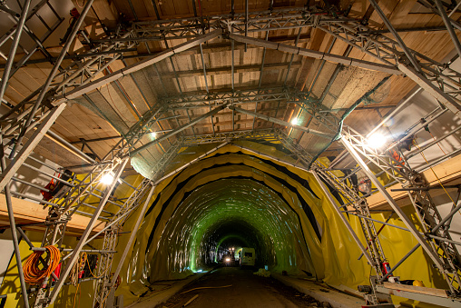 Construction work during the building of a highway tunnel in the European Alps.