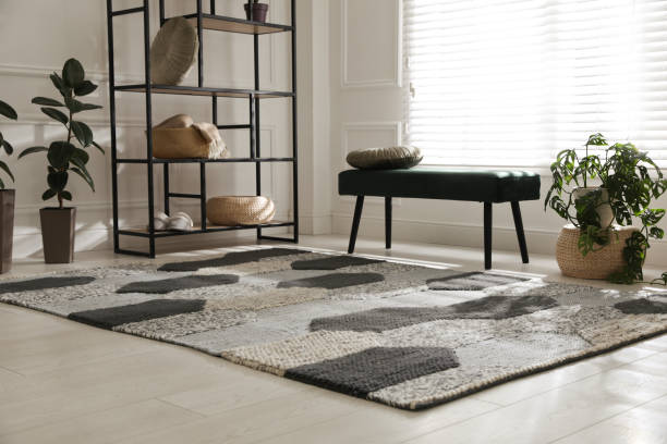 tapis élégant avec motif sur le sol dans la chambre - tapis décoratif photos et images de collection
