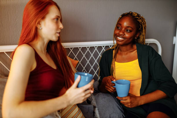istock mixed race women at their house together 1391596924