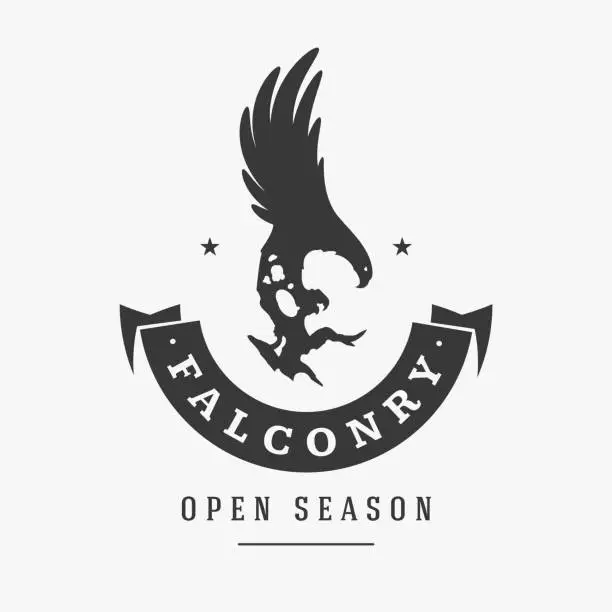 Vector illustration of Falconry with silhouette attacking hawk vector logo. Majestic black bird prepared for hunting small animals.