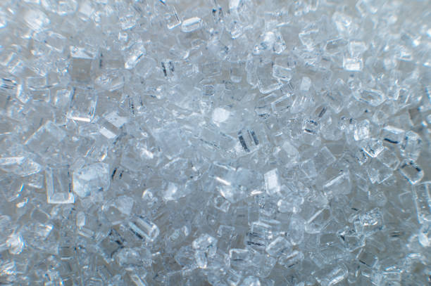 istock Sugar crystals. Great zoom, extreme macro. For illustration, texturing and collage. Sugar in shallow depth of field 1391599030
