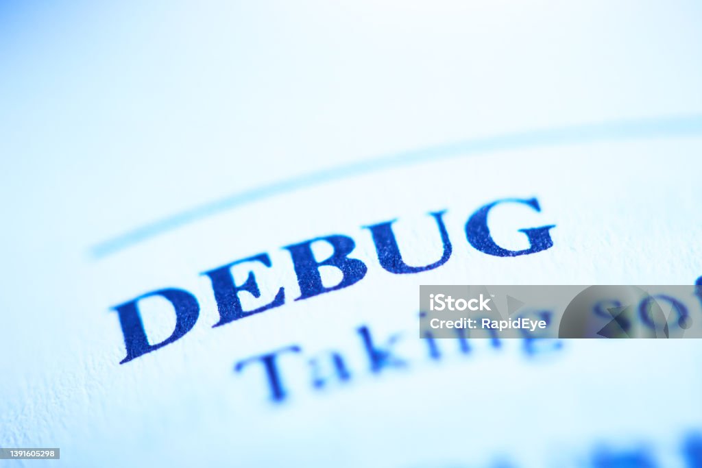 Debug defined in a business dictionary Close-up of the bold term DEBUG in tight close-up shot of an entry in a business dictionary. Black Color Stock Photo