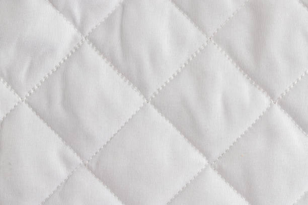 blanket with polyester filling, cotton cover, quilted with machine-stitched chain stitch
