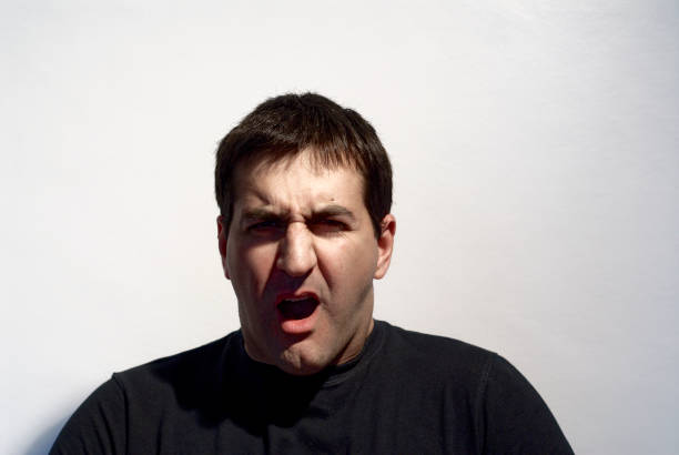 istock adult man making curious expressions with face 1391615899