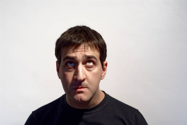 istock adult man making curious expressions with face 1391616009