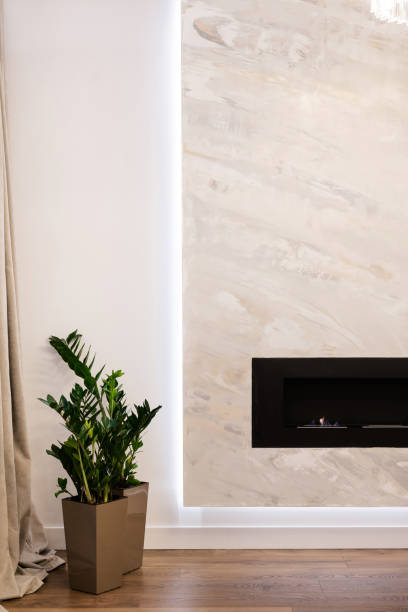 istock new black metal fireplace in the backlit room 1391624904
