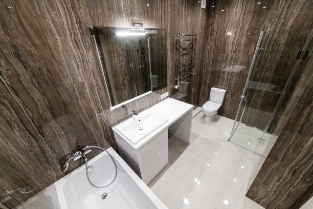 istock new clean bath with dark marble mirror tiles 1391625077