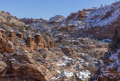 a scenic snow covered landscape in Zion National Park Utah in winter
