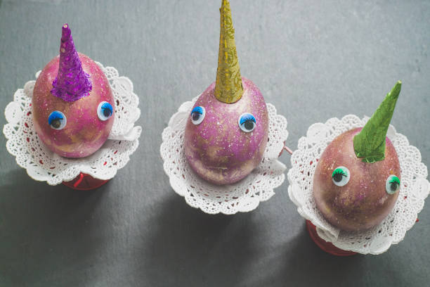 cute unicorns space easter eggs with colorful horns and toy eyes on black background. - napkin black blank ideas imagens e fotografias de stock