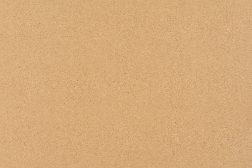 Fondo de textura de papel o cartón marrón. photo