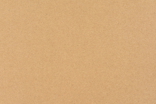 Brown paper or cardboard texture background.