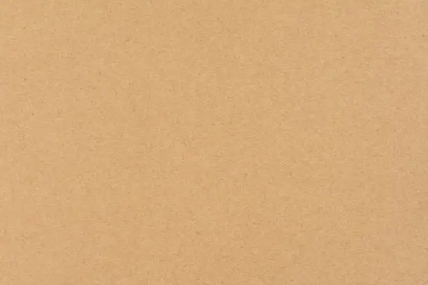 Brown paper or cardboard texture background.