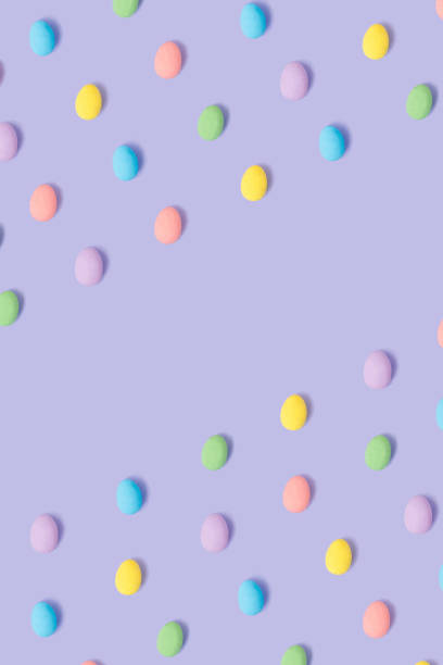 istock Pattern made of colorful Easter eggs on pastel purple background. Minimal trendy Easter Holiday concept with copy space. 1391629604