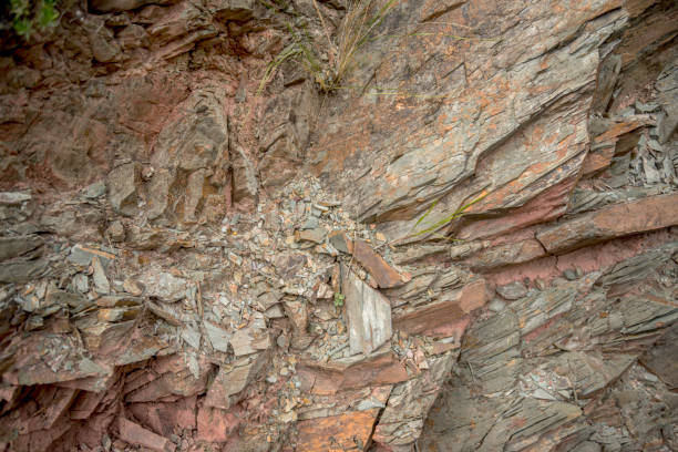 istock surface of cracked natural stone in which the reddish tones predominate 1391636058