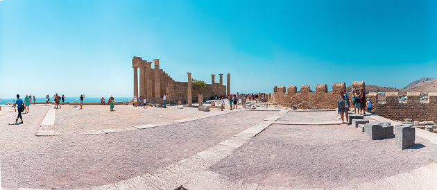 Large panorama of the Acropolis of Lindos in the heart of the plateau with the ruins of the temple. Rhodes. Greece