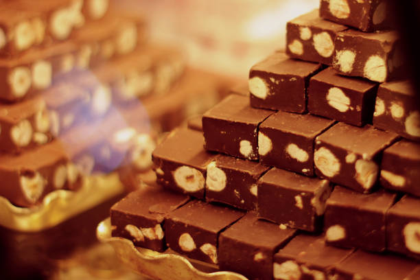 istock a showcase with sweets laid out in a stack. chocolate nougat with nuts 1391636451