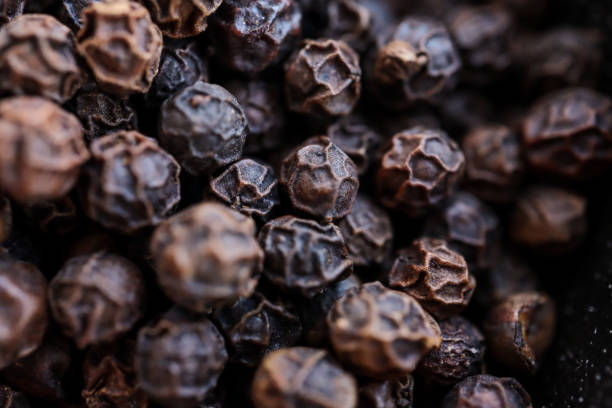 istock Macro photo of black peppercorns 1391640483