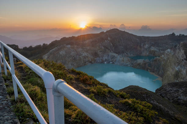 istock Sunrise in Crater Lake Kelimutu 1391643797