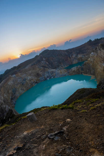 istock Sunrise in Crater Lake Kelimutu 1391643801