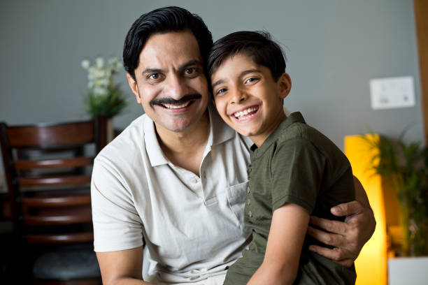 istock Loving father and son at home 1391647169
