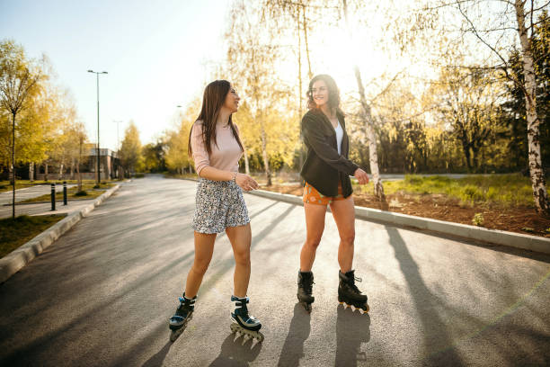 istock Young women skating on a sunny day 1391648510