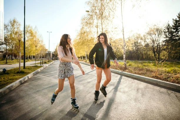 istock Young women skating on a sunny day 1391648522
