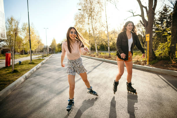 istock Young women skating on a sunny day 1391648666