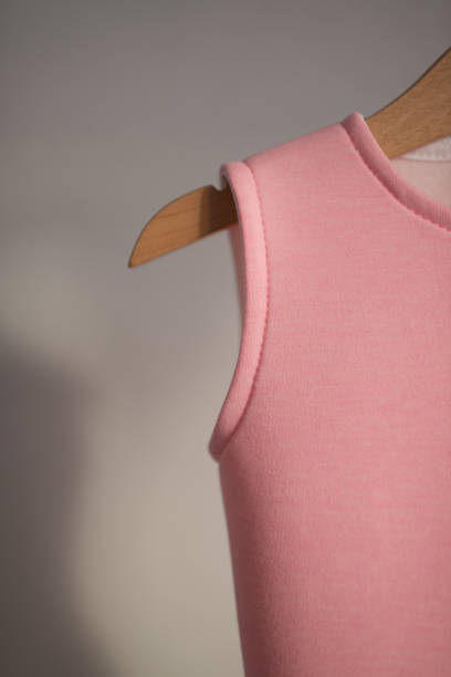 istock The pink dress is hanging on a hanger. 1391650775
