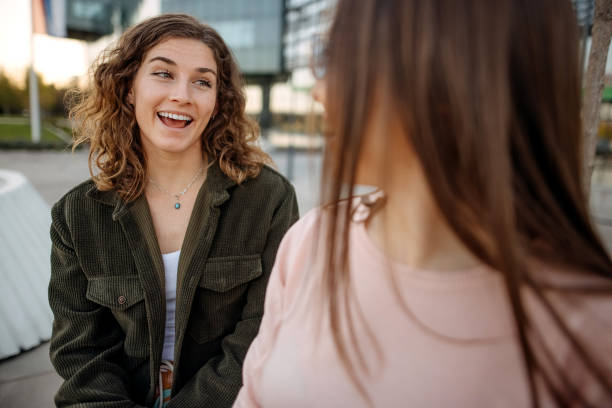 istock Happy woman looking at friend 1391650800