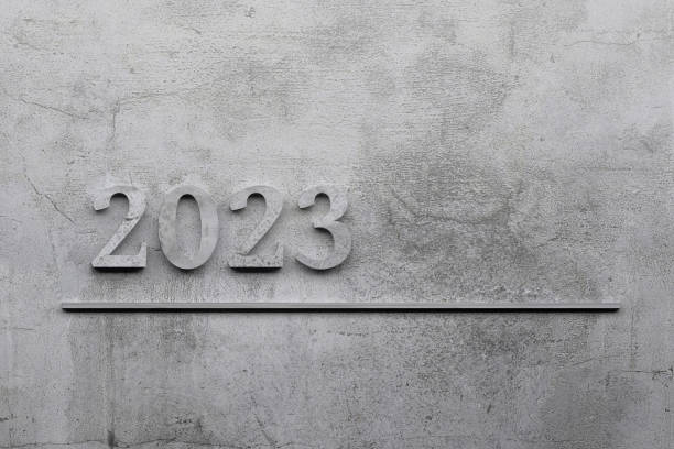 Year 2023 greeting card with concrete year 2023 numbers stock photo