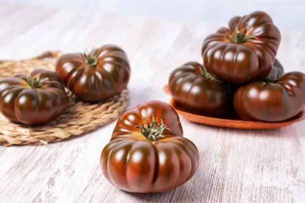 Variety of tomatoes called Raf, with dark skin and sweet flavor.