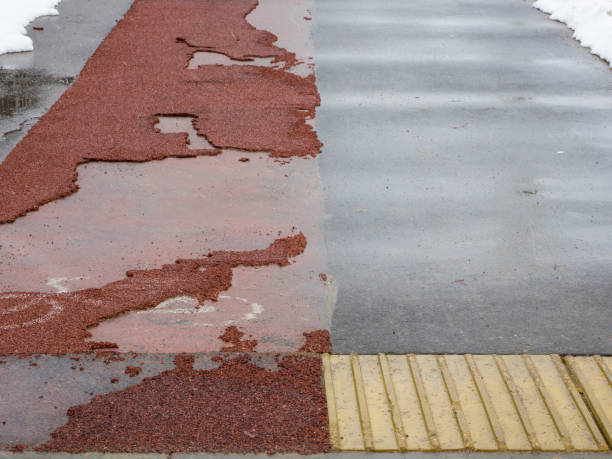 istock poor-quality bike path collapsed after winter 1391654963