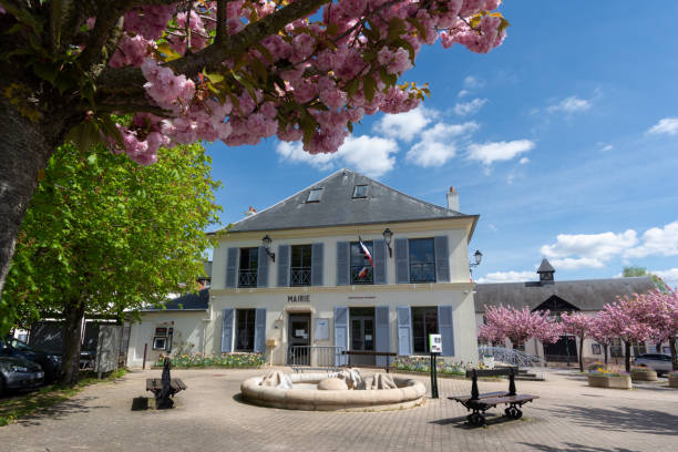 Exterior view of the town hall of Saclay, France Saclay, France - April 15, 2022: Exterior view of the town hall of Saclay, a French commune in the southwestern suburbs of Paris located in the Essonne department, in the Île-de-France region essonne stock pictures, royalty-free photos & images