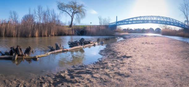 A footbridge at Blue Heron Pond in Windsor, Ontario in springtime
