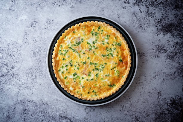istock Bacon quiche with cheese and scallions in a plate 1391666165