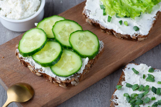 istock Healthy sandwich with white cottage cheese and cucumber 1391668385