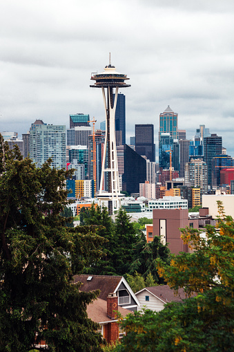 Vancouver as seen from viepoint  on the road to Cypress bowl. First nation totem pole in the front