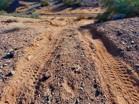 A muddy road on the grassland