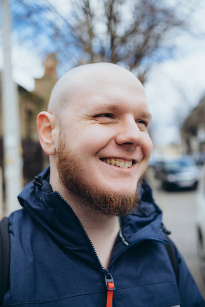 istock A white man with bald head and beard has a rest in a park 1391690126