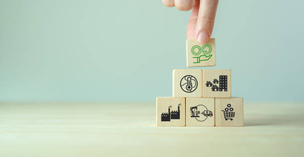 istock Circular economy concept. Business and environment sustainable. Climate changing problem solving goals.
Stacking wooden cubes with sustainability icon on pollution sources icon with grey background. 1391695732